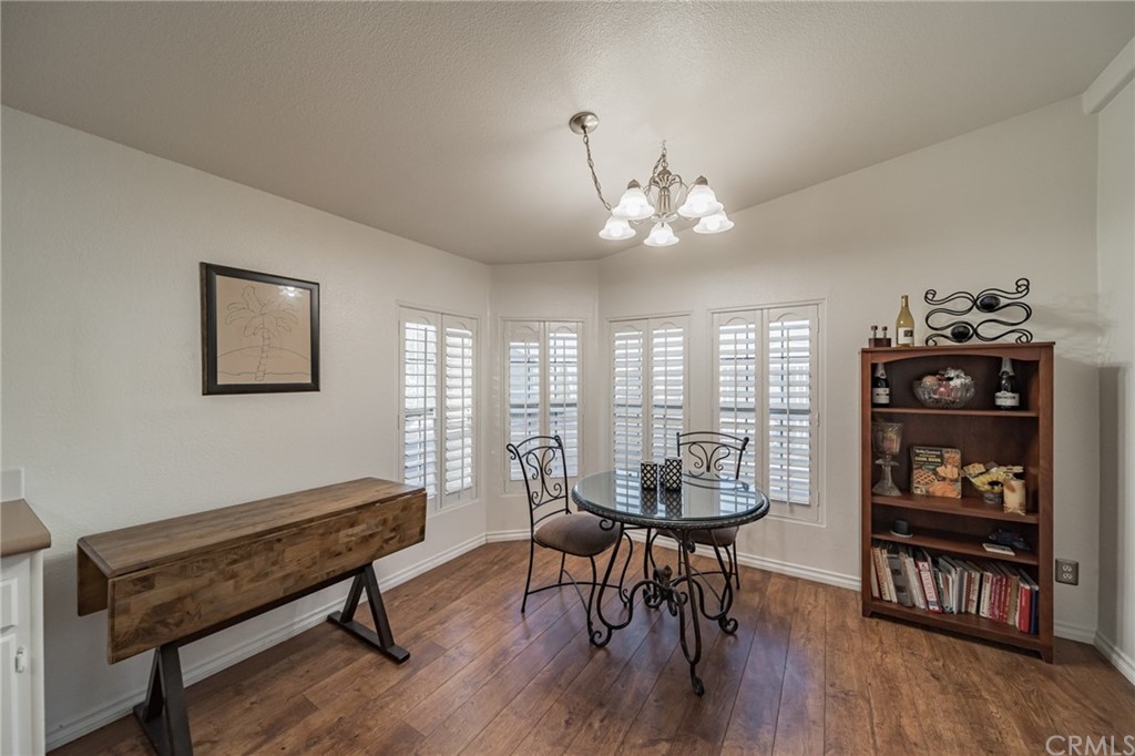 23301 Ridge Rte Drive, Unit 229 Laguna Hills, CA 92653 - Photo 5 of 26 a view of a livingroom with furniture and a lounge chair