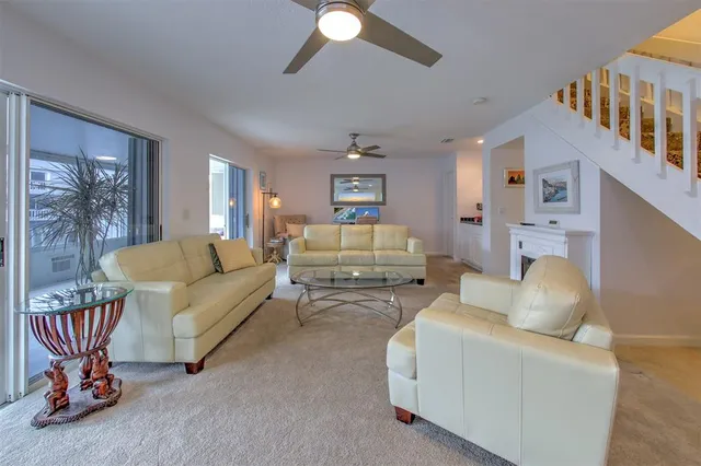 a view of a bathroom with a sink and mirror