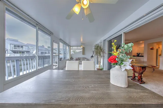 a view of a balcony with wooden floor
