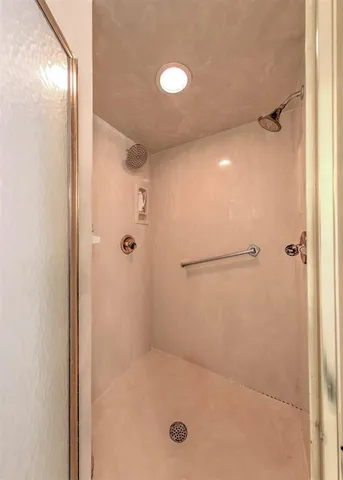 a bedroom with furniture and a wooden floor