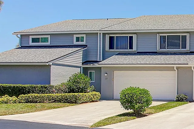 a view of a hallway with a white walls