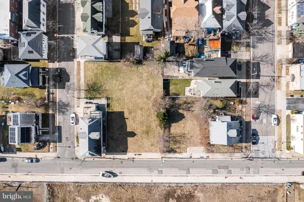 a view of a street with cars