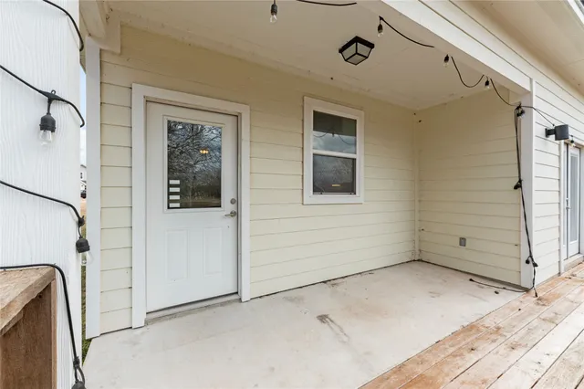 a bathroom with a granite countertop sink a mirror and a vanity