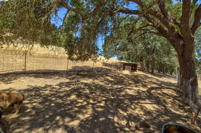 a view of a road with an outdoor space
