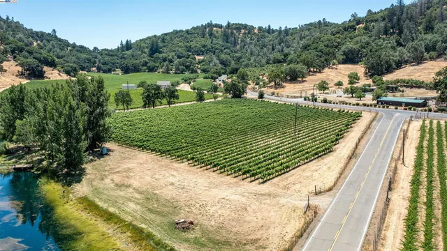 a view of a road with a yard