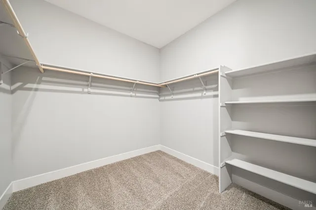 a view of an empty walk in closet