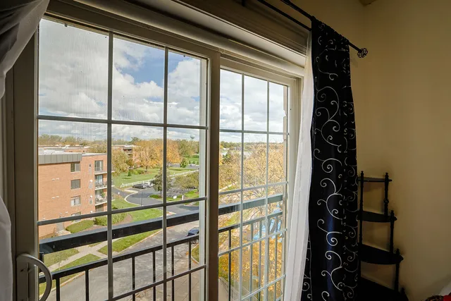 a view of a room with windows