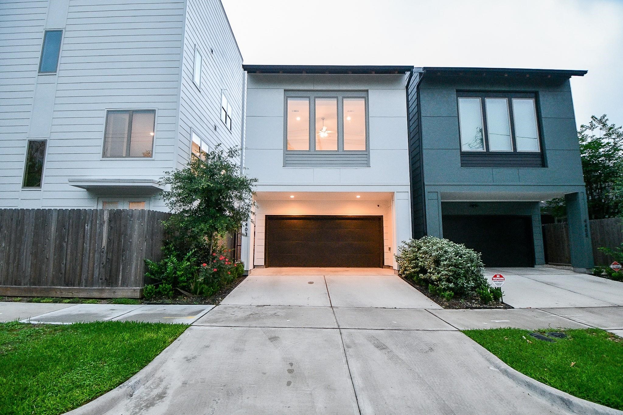 4403 Greeley Street Houston, TX 77006 - Photo 1 of 28 a white house with yard in front of it