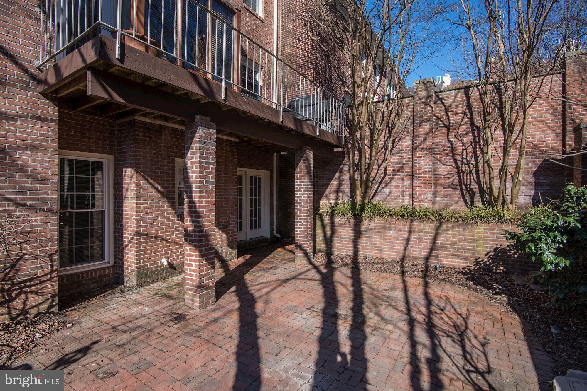 8401 Quarry Ridge Road Bethesda, MD 20817 - Photo 22 of 23 Bricked Private Patio with Deck above