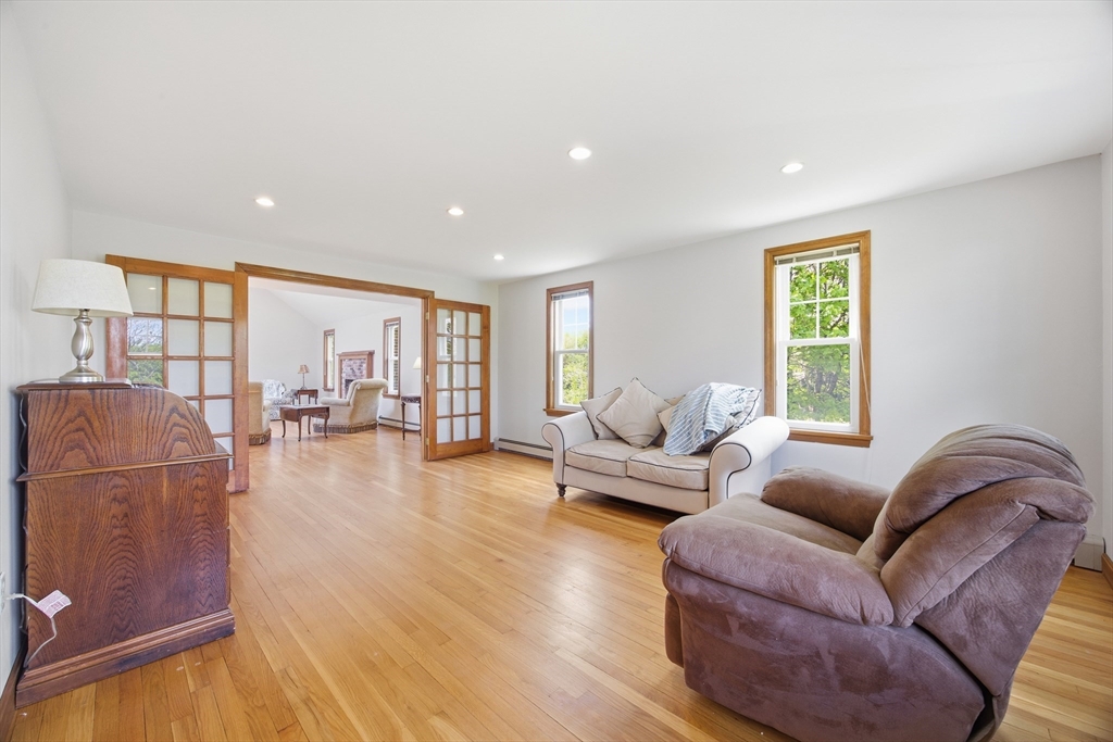 50 Harborview Road Hull, MA 02045 - Photo 14 of 41 a living room with furniture and a window