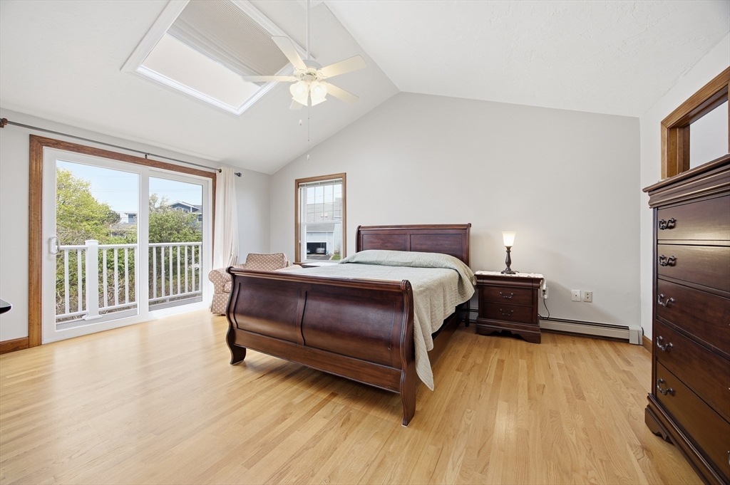 50 Harborview Road Hull, MA 02045 - Photo 16 of 41 a bedroom with a bed and a large window