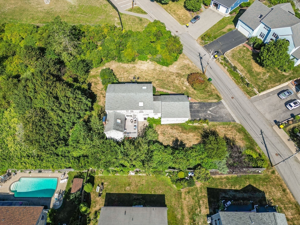 50 Harborview Road Hull, MA 02045 - Photo 40 of 41 an aerial view of a house with a yard