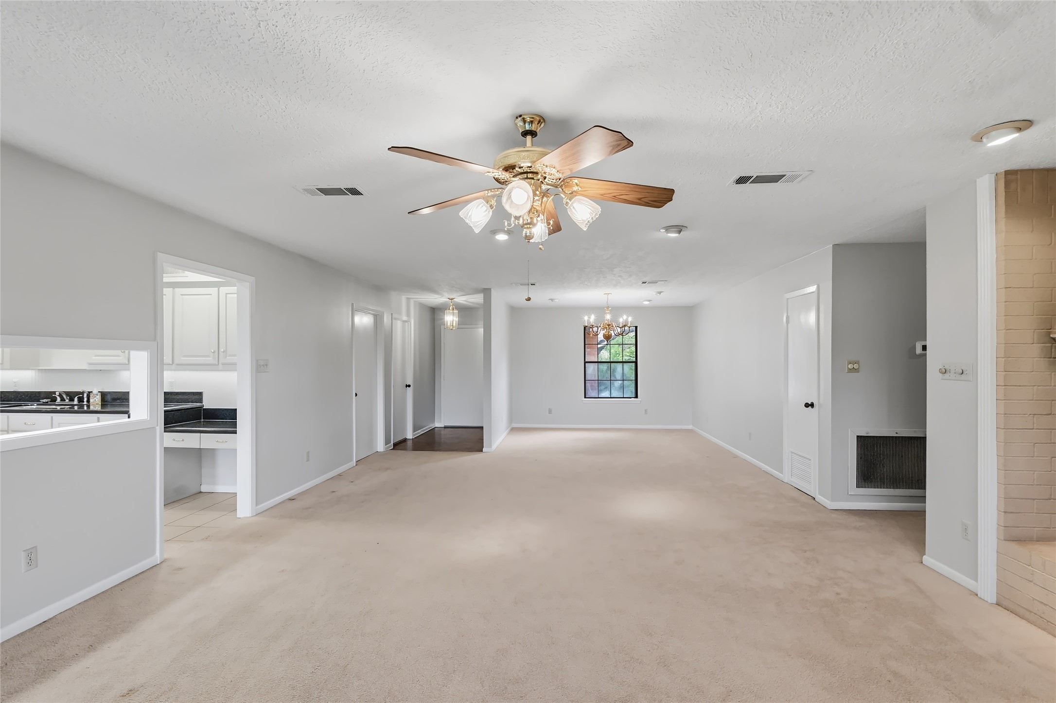 807 Standley Road Madisonville, TX 77864 - Photo 12 of 35 a view of an empty room with a window