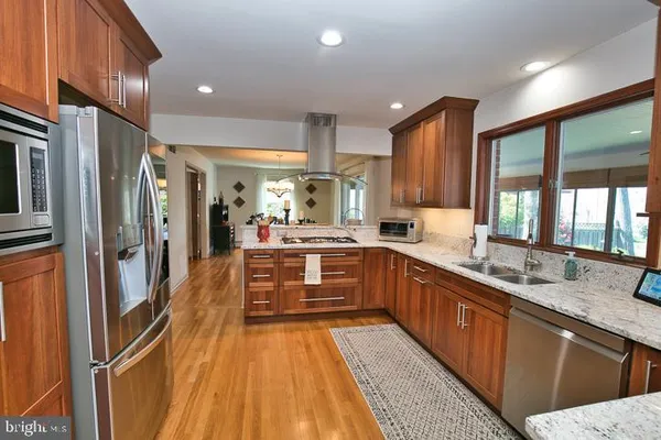 a workspace with furniture and wooden floor