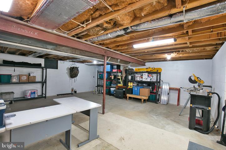 1124 Riverside Drive Salisbury, MD 21801 - Photo 42 of 83 Basement with shelving