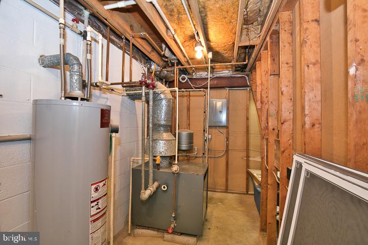 1124 Riverside Drive Salisbury, MD 21801 - Photo 43 of 83 Furnace and hot water heater and electric panels