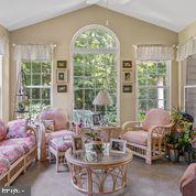 33791 Bay Ridge Lane Lewes, DE 19958 - Photo 22 of 64 Bright, Airy Sunroom with Cathedral Ceilings.
