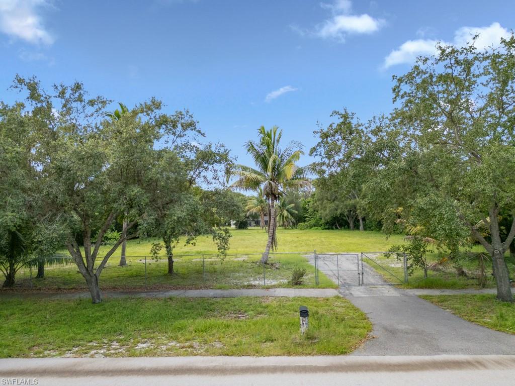 172 Hickory Road Naples, FL 34108 - Photo 4 of 11 a view of a playground with a yard