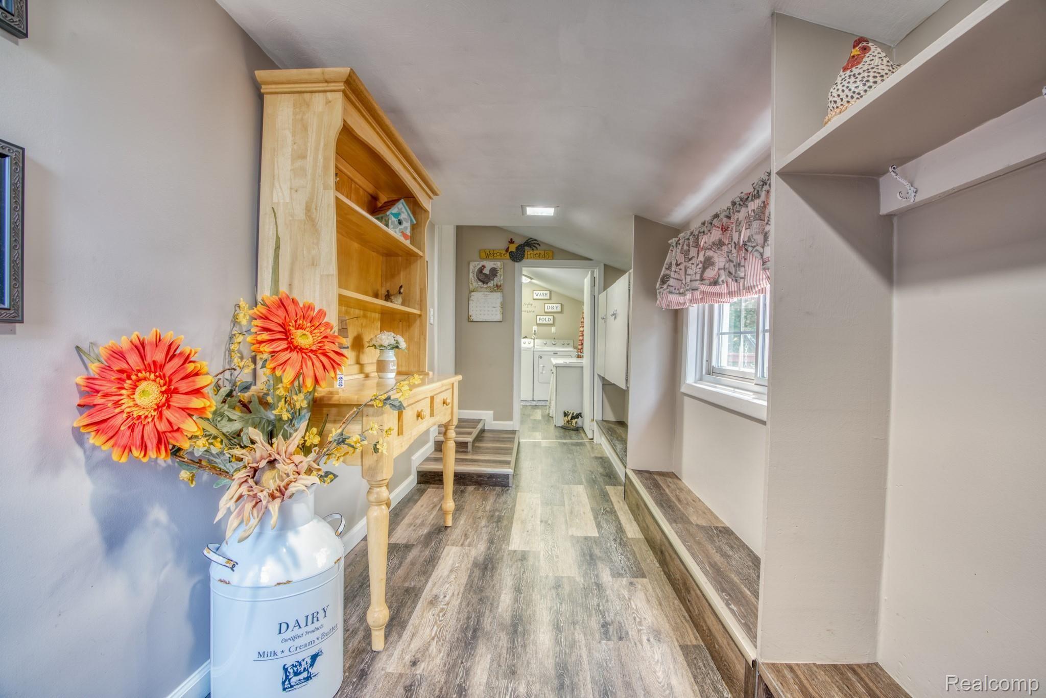 4065 Jewell Road Howell, MI 48843 - Photo 25 of 62 SIDE ENTRY MUD ROOM HAS LOTS OF SPACE FOR BOOTS AND COATS