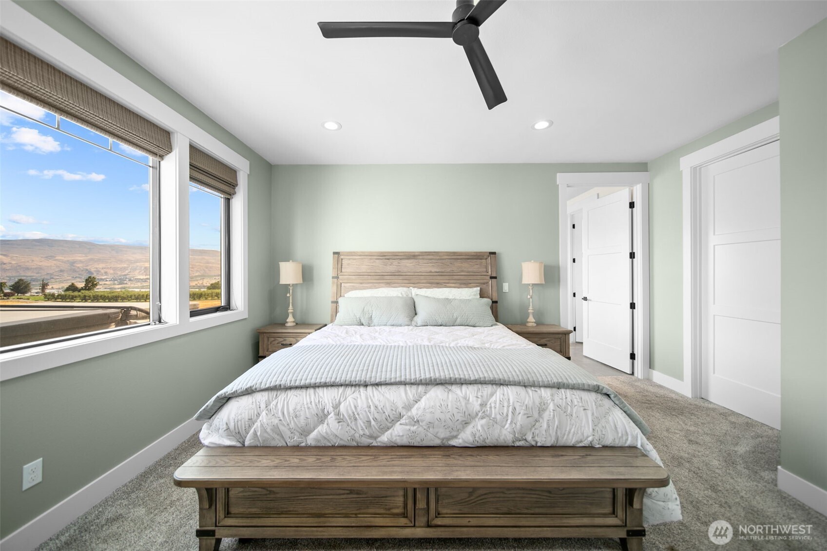 2002 North Road Wenatchee, WA 98801 - Photo 22 of 40 a bedroom with a bed and large window