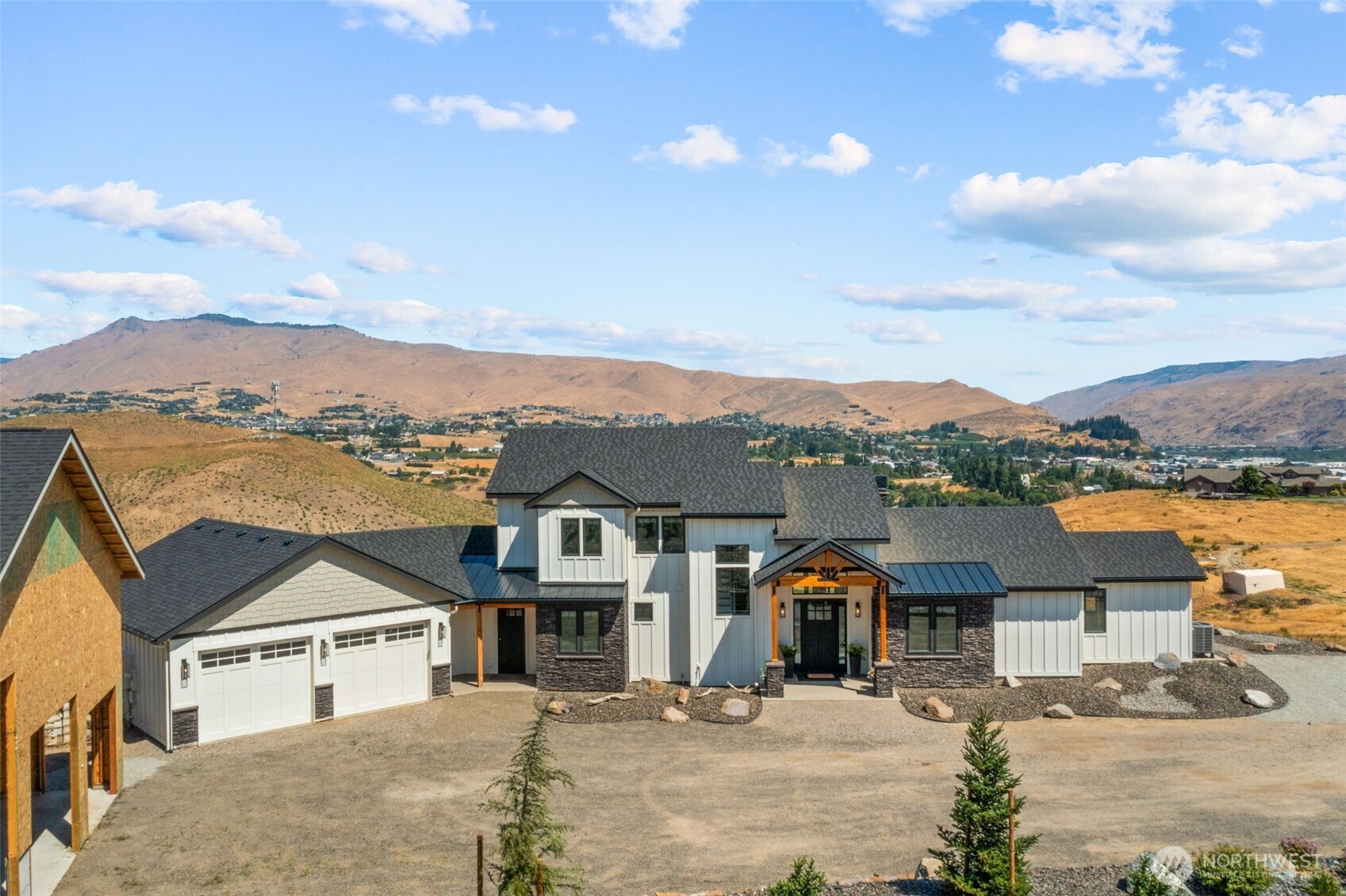2002 North Road Wenatchee, WA 98801 - Photo 3 of 40 a front view of a house with a ocean view