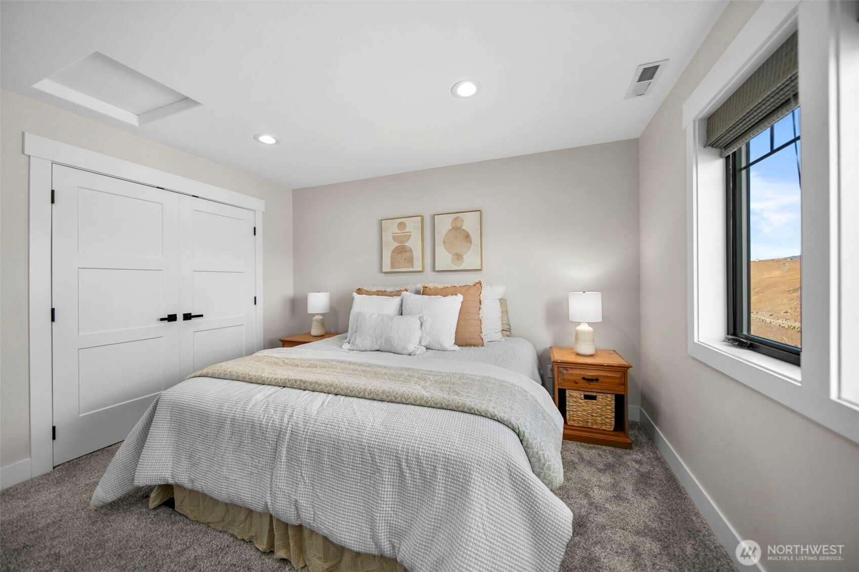 2002 North Road Wenatchee, WA 98801 - Photo 32 of 40 a bedroom with a bed and a window