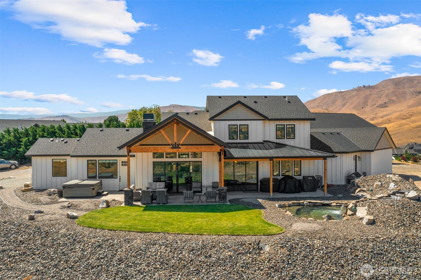 2002 North Road Wenatchee, WA 98801 - Photo 5 of 40 a view of a house with swimming pool and a yard
