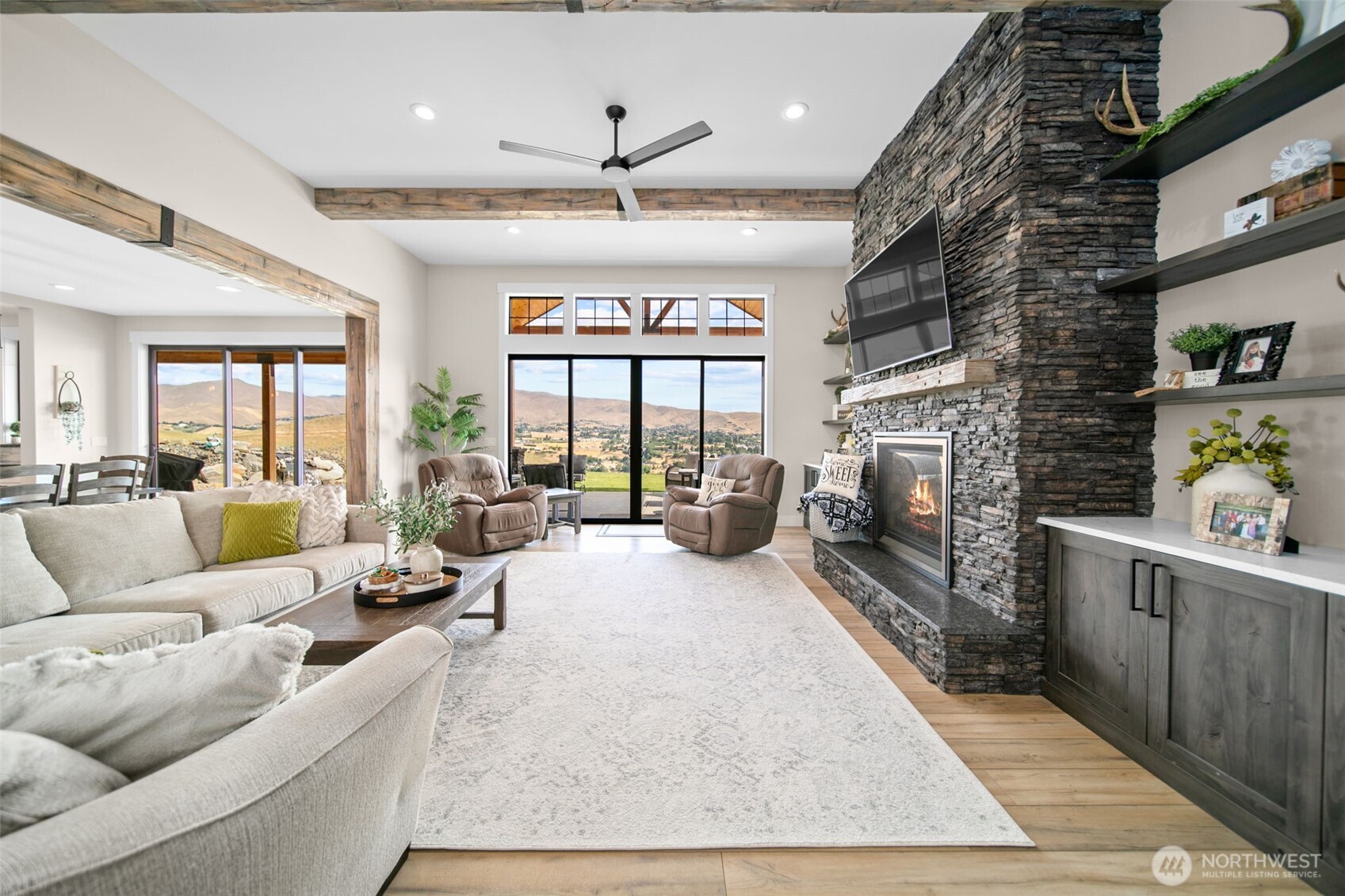 2002 North Road Wenatchee, WA 98801 - Photo 8 of 40 a living room with furniture large window and flat screen tv