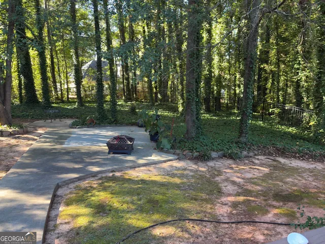a view of swimming pool in a yard