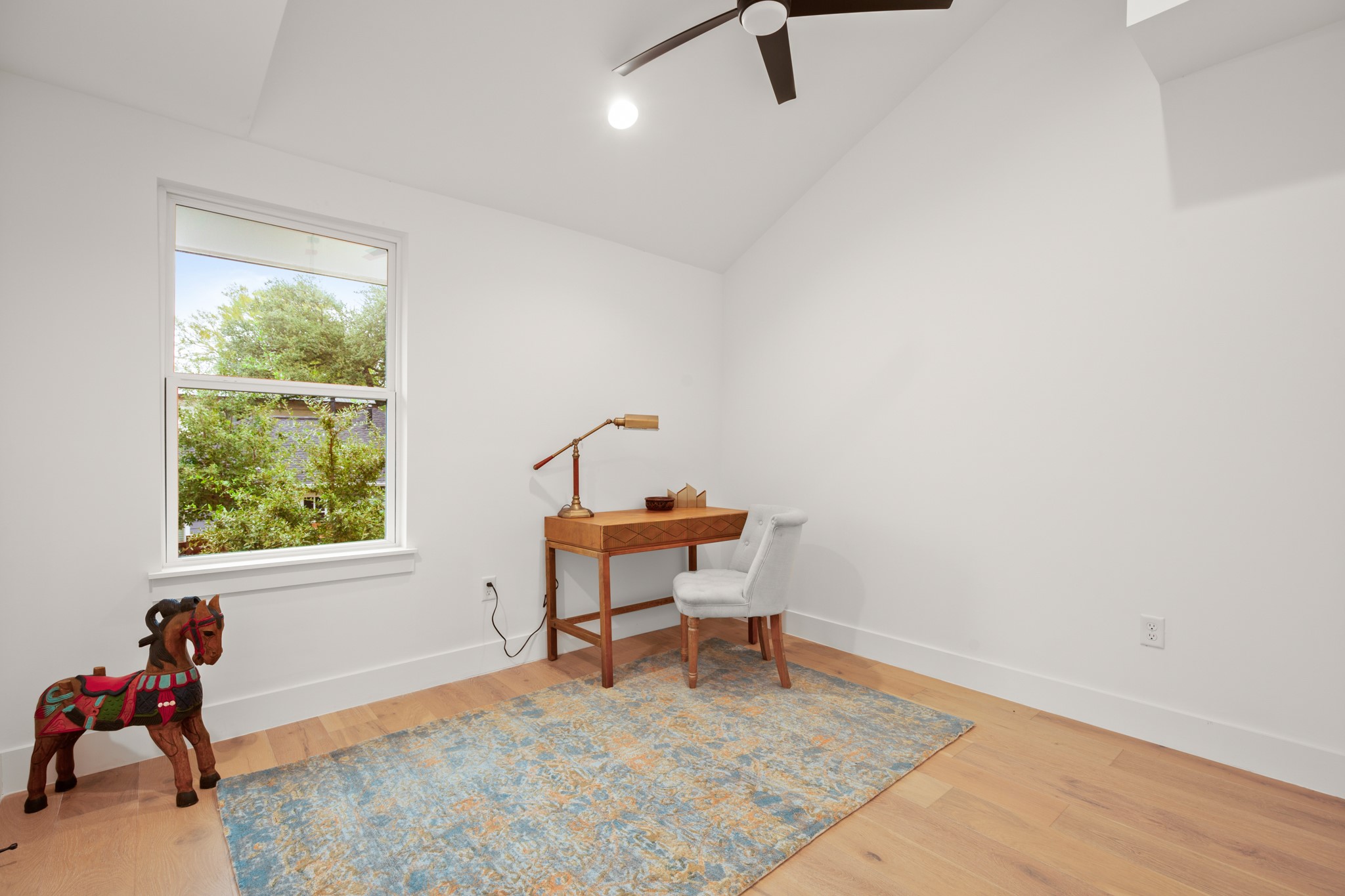 2416 East 10th Street Austin, TX 78702 - Photo 14 of 38 a living room with furniture and a window