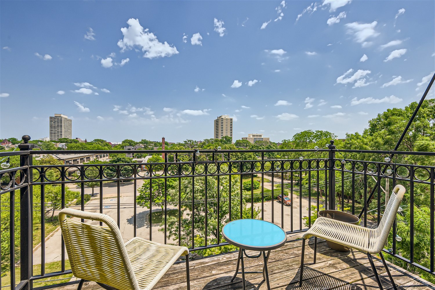 3719 South Indiana Avenue, Unit 4S Chicago, IL 60653 - Photo 16 of 17 a view of a balcony with chairs