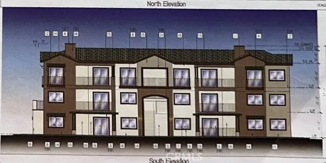 a front view of a building with a yard