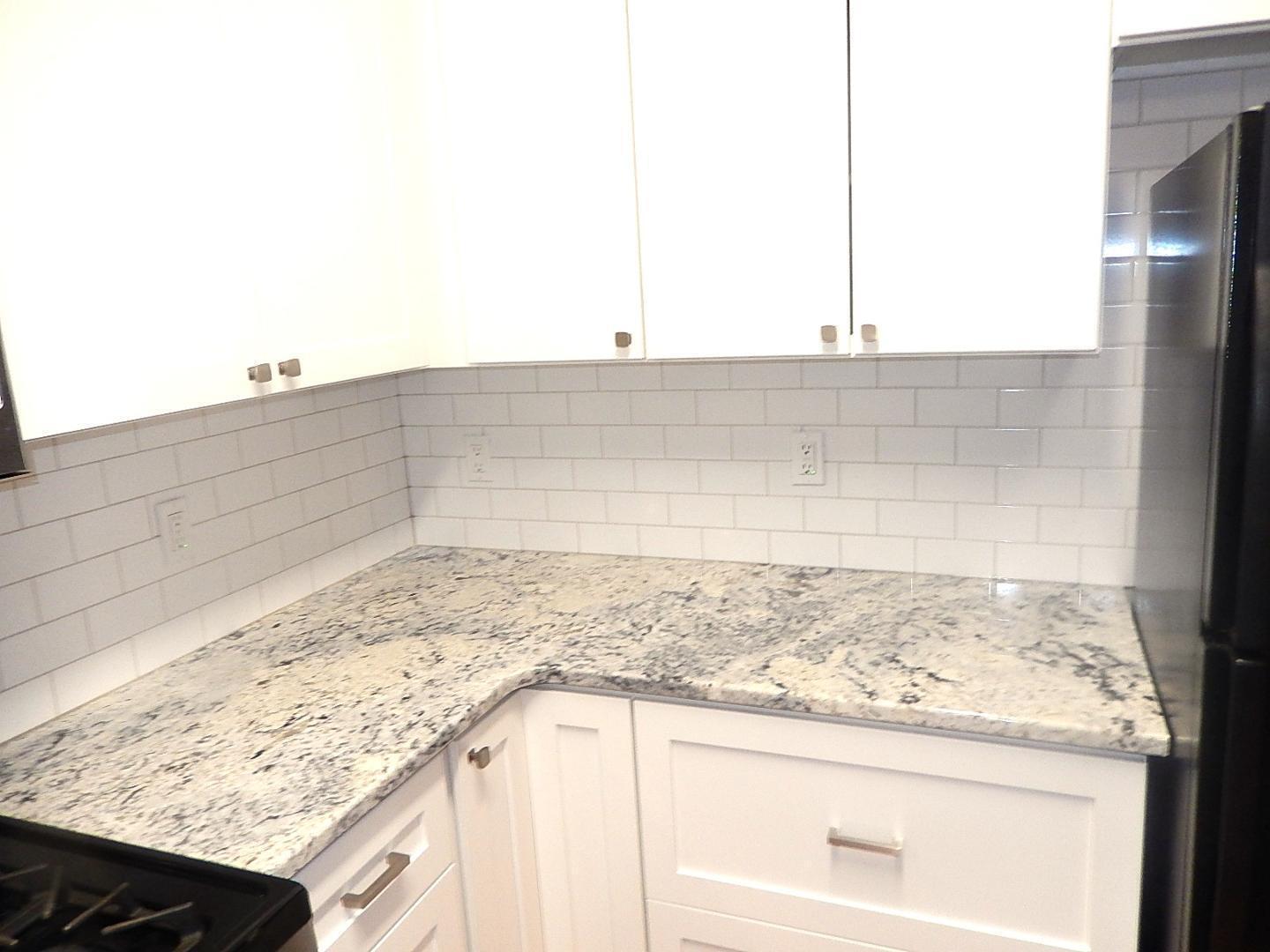 211 Bridgepath Drive Cary, NC 27513 - Photo 8 of 26 a view of kitchen island sink and cabinets