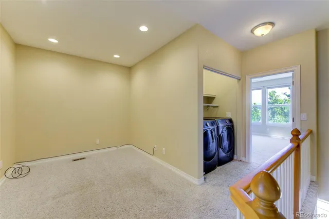 a view of a hallway with closet