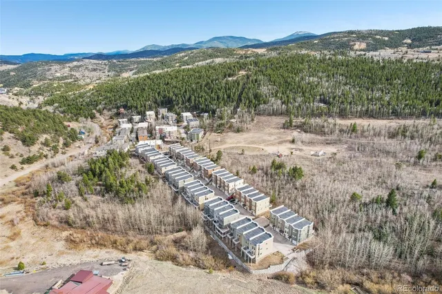 a view of an mountain with a lake view