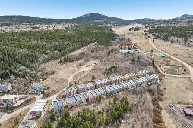 a outdoor space with lots of table and chairs