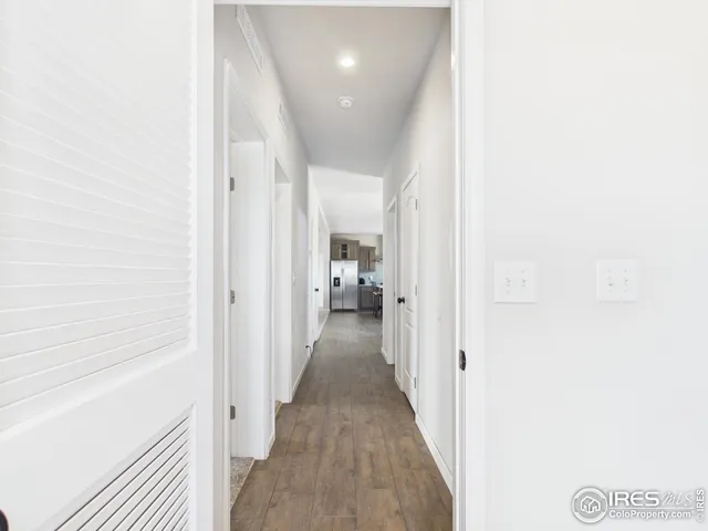 a view of hallway with livingroom
