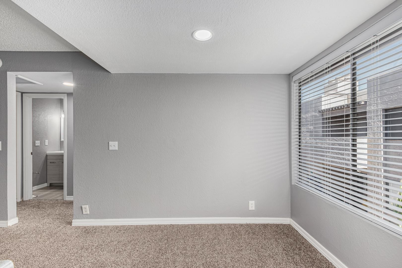 1077 West 1st Street, Unit 203 Tempe, AZ 85281 - Photo 8 of 22 a view of livingroom with window