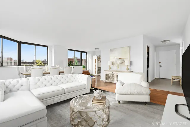 a view of an empty room with kitchen