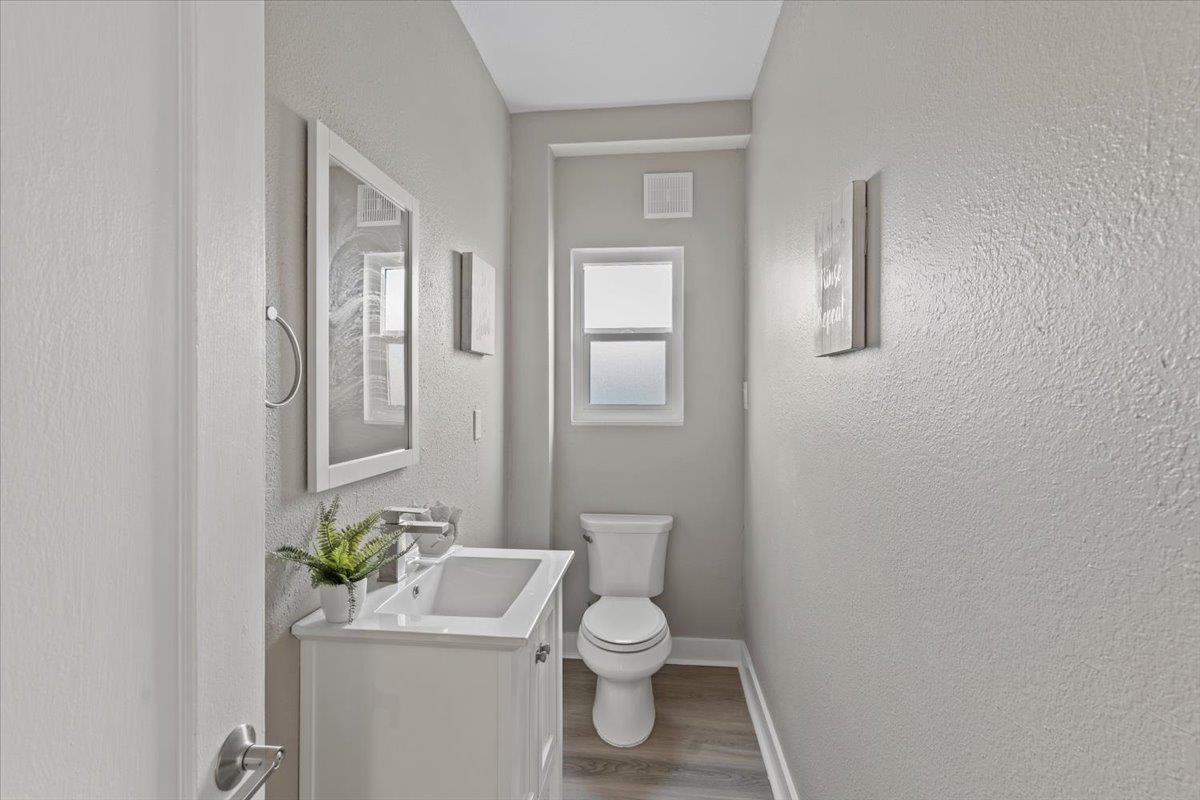 1306 Channing Way Berkeley, CA 94702 - Photo 11 of 42 a white toilet sitting next to a bathroom sink