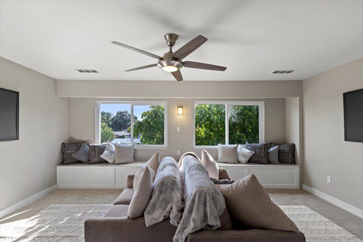 1306 Channing Way Berkeley, CA 94702 - Photo 19 of 42 a living room with furniture and a large window