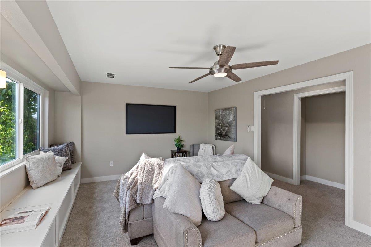 1306 Channing Way Berkeley, CA 94702 - Photo 21 of 42 a living room with furniture and a ceiling fan