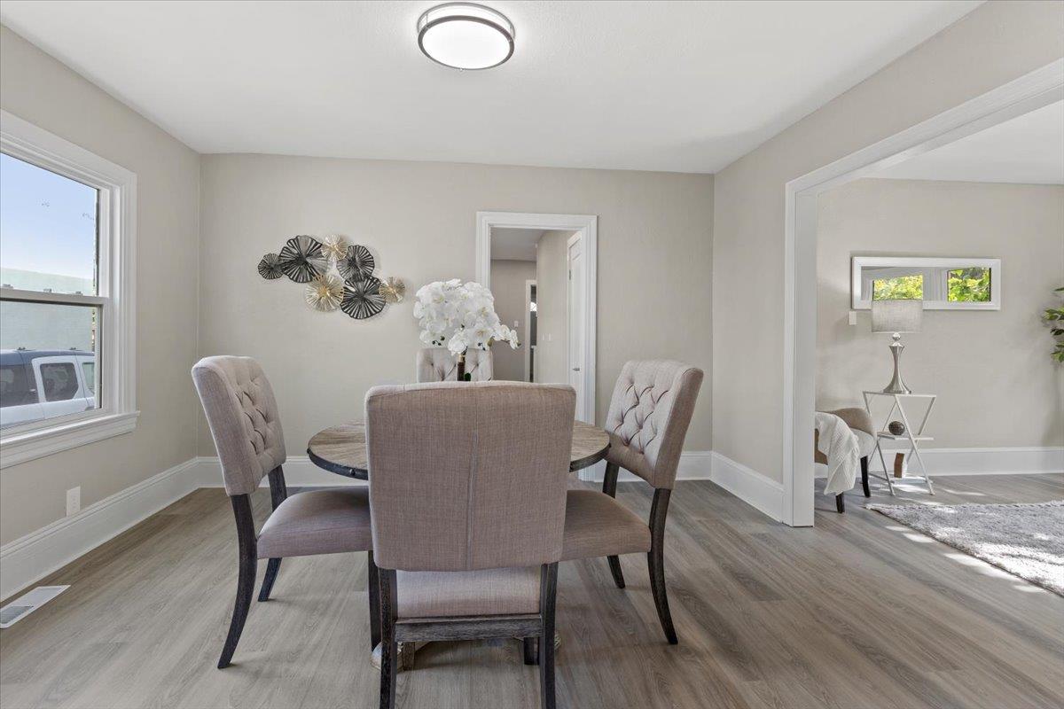 1306 Channing Way Berkeley, CA 94702 - Photo 5 of 42 a dining room with furniture and wooden floor