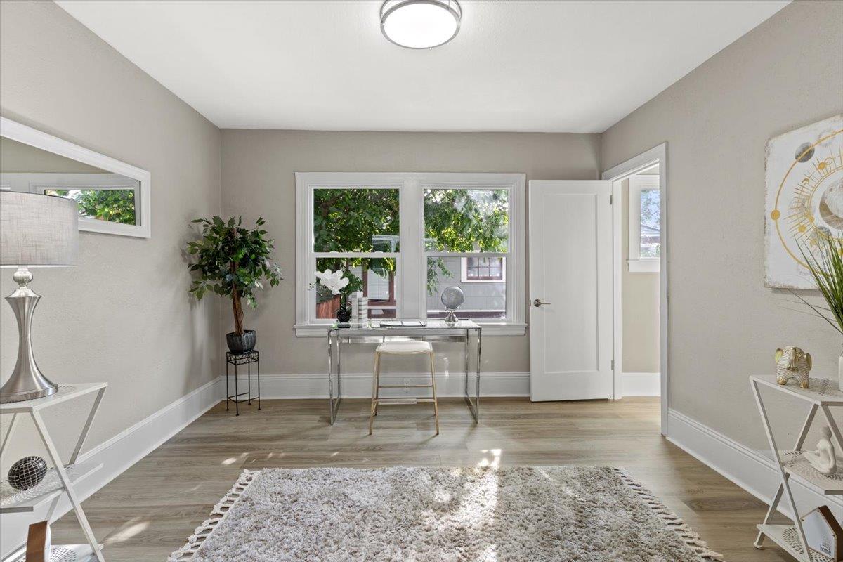 1306 Channing Way Berkeley, CA 94702 - Photo 7 of 42 a living room with furniture and a large window