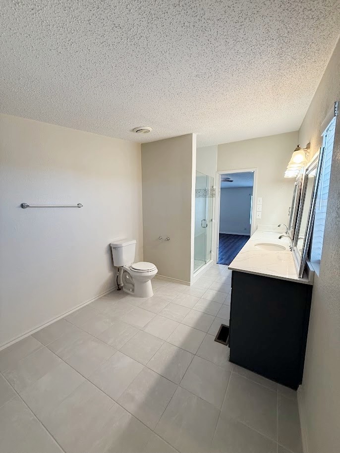 2709 County Road 463 Elgin, TX 78621 - Photo 13 of 25 a living room with furniture and a toilet