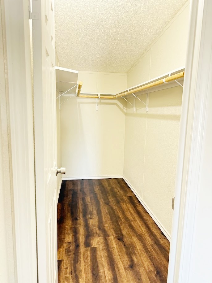 2709 County Road 463 Elgin, TX 78621 - Photo 15 of 25 a view of a room with wooden floor