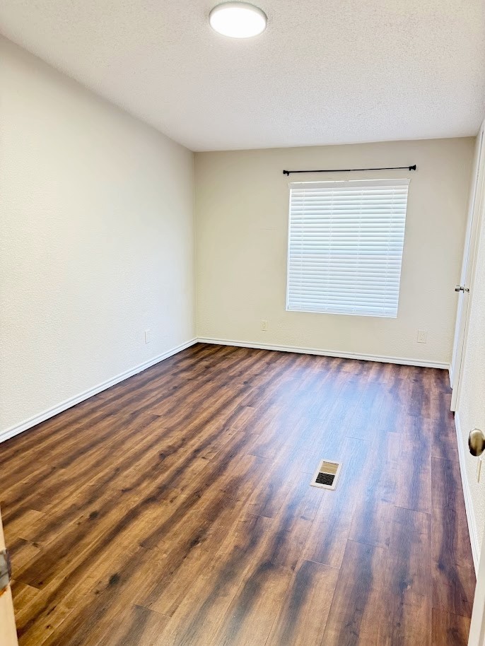 2709 County Road 463 Elgin, TX 78621 - Photo 19 of 25 wooden floor in a room