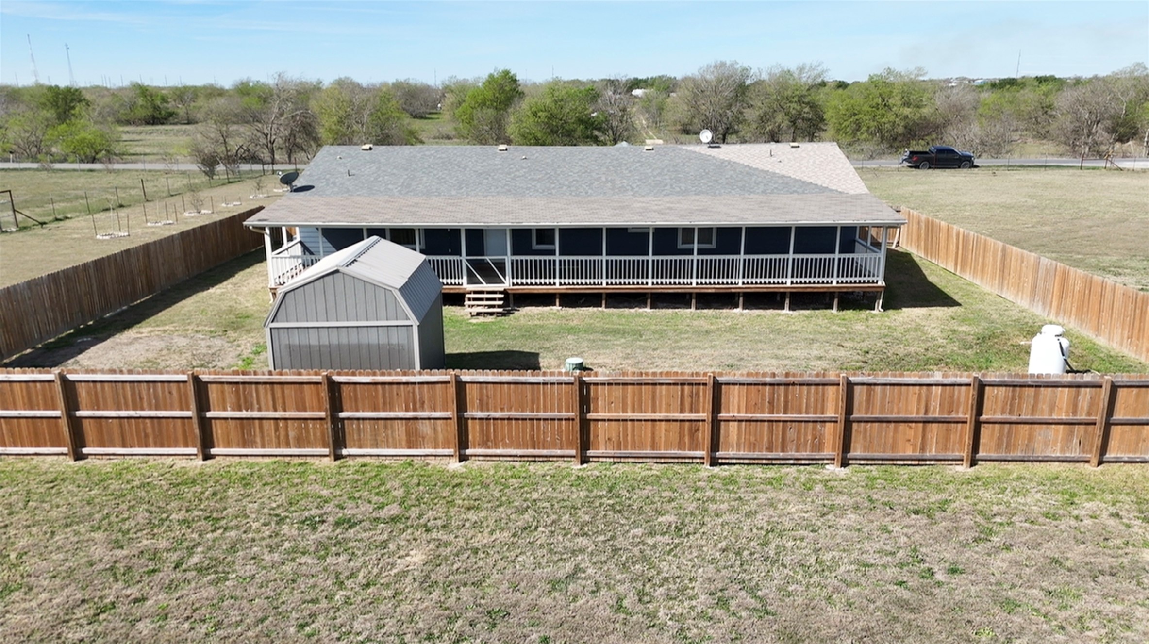 2709 County Road 463 Elgin, TX 78621 - Photo 24 of 25 a view of a house with a yard