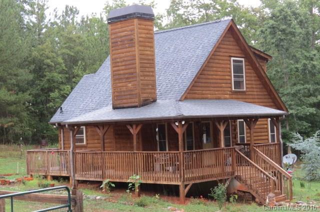 7275 Poors Ford Road Rutherfordton, NC 28139 - Photo 1 of 24 a front view of a house with balcony