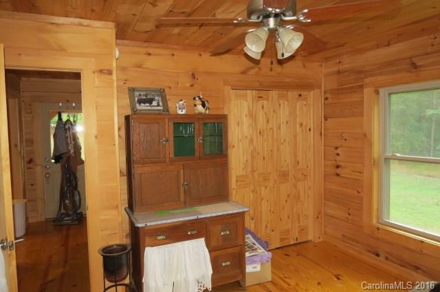 7275 Poors Ford Road Rutherfordton, NC 28139 - Photo 12 of 24 a bathroom with a sink a mirror and shower